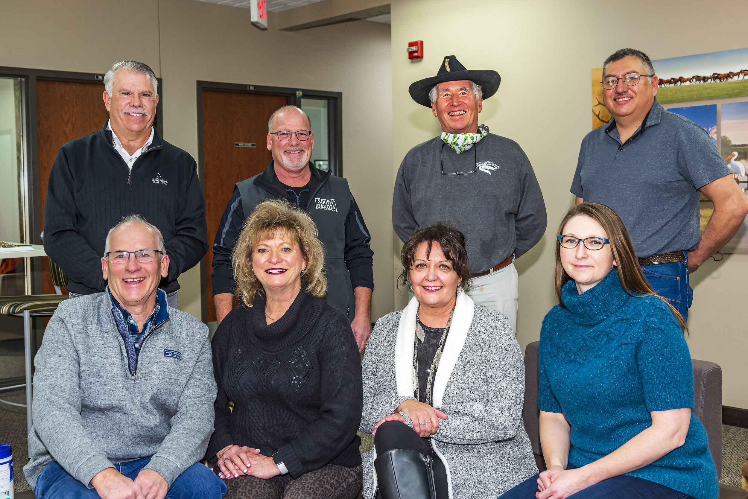 Photo of board: Front row left to right: Frank Smith, Gettysburg; Kristi Wagner, Whitewood; Carmen Schramm, Yankton; Ann Lesch, De Smet. Back row left to right: Tom Biegler, Sioux Falls; Val Rausch, Big Stone City; John Brockelsby, Rapid City; Ivan …