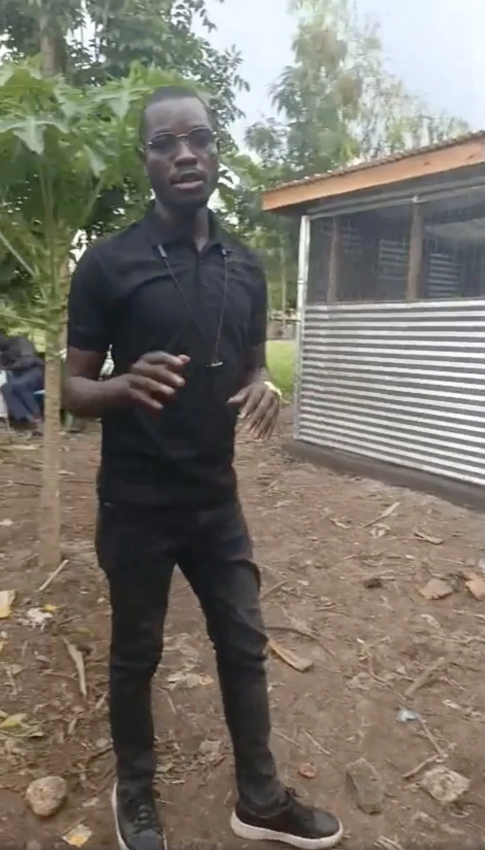 Jerim showing off the newly built chicken coop