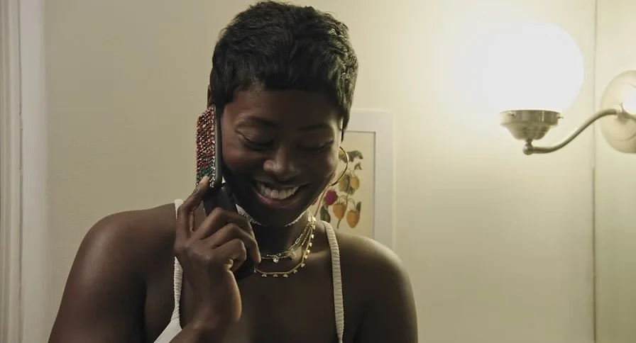 "DIRTY DISHES" -  (American Film Industries).......Symone Holmes as Tiana