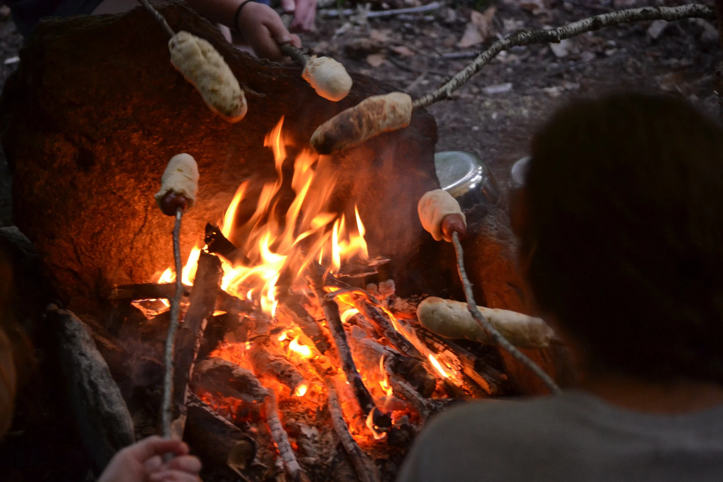 Cooking bannock on the fire