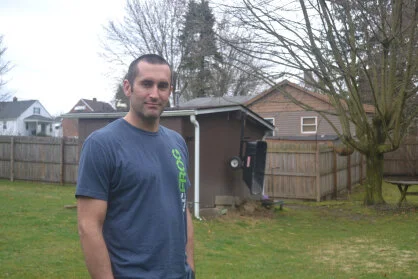 John Macus in his backyard in Jefferson Hills.