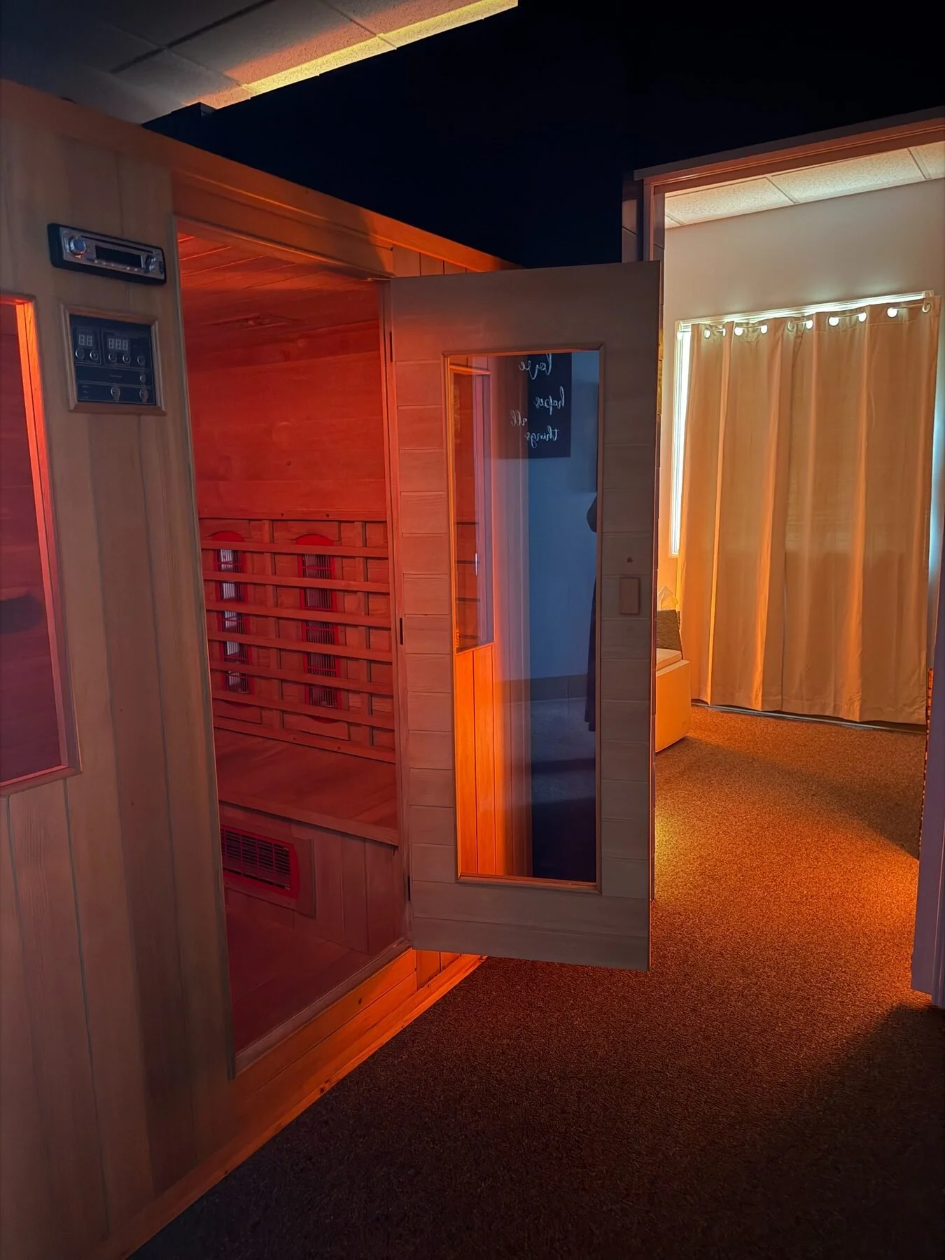 Infrared sauna with chromotherapy lighting at Elite Retreat Wellness Center