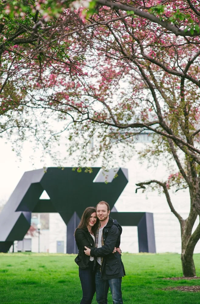 Detroit engagement photography capturing a candid exchange.