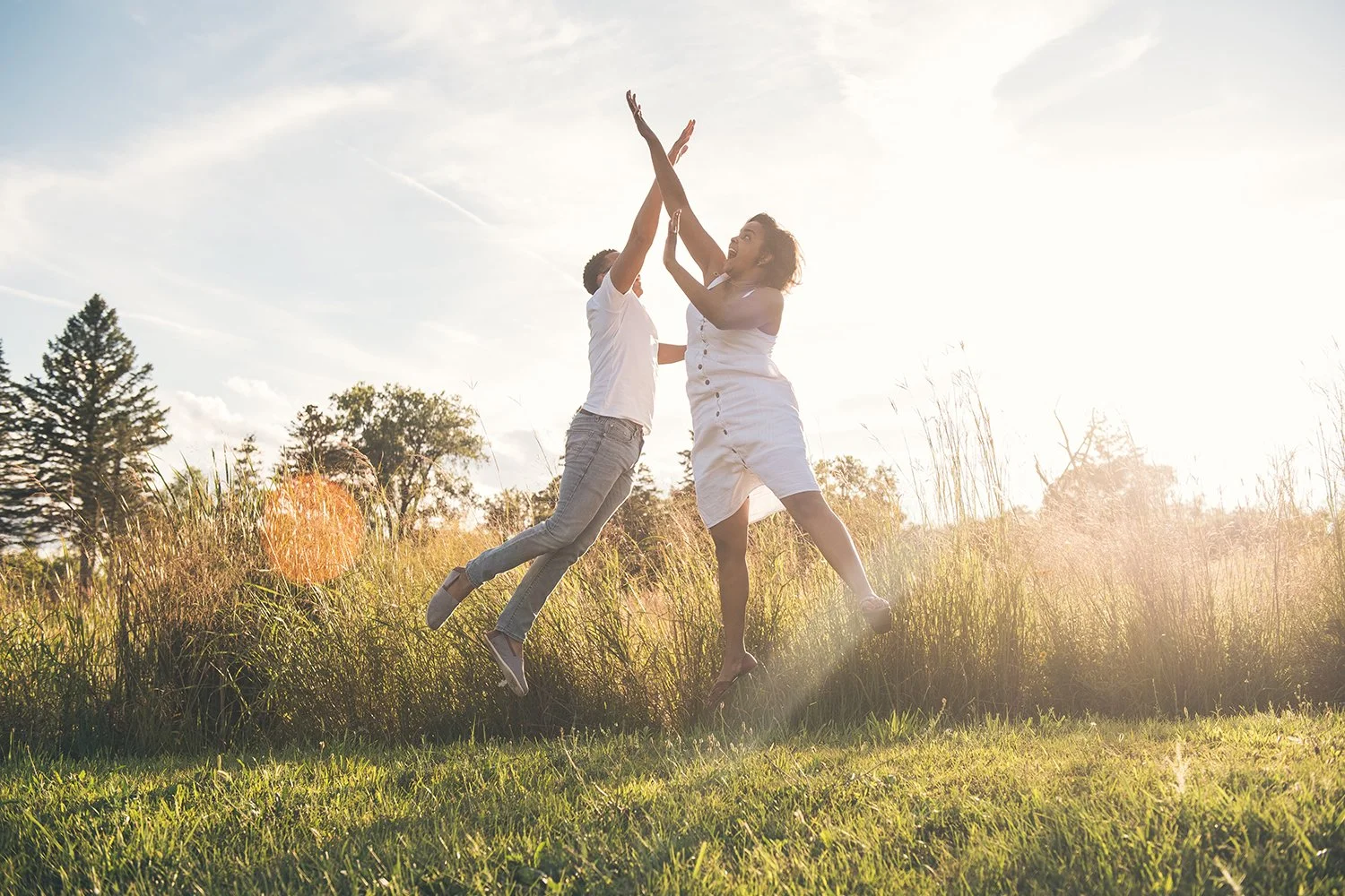 Couple photographed in Detroit during an engagement shoot with natural light.
