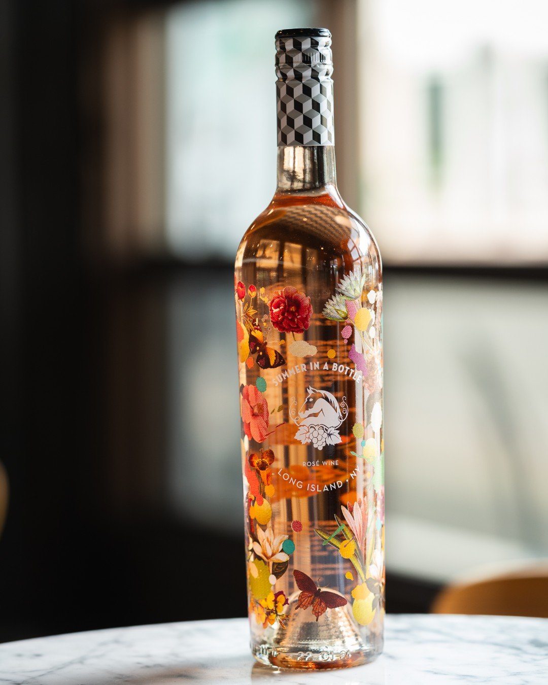 Summer in a Bottle Ros&eacute; is here and ready to steal the show at your next dinner party, picnic, or patio hang.