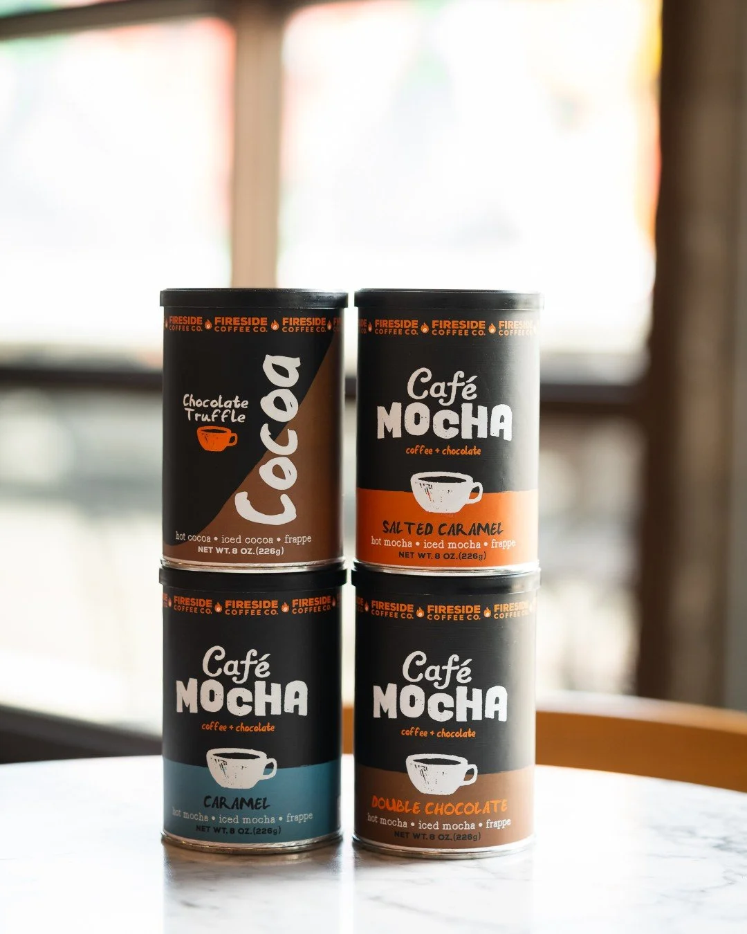 Perfect for cozy mornings, chilly nights, or a sweet midday pick-me-up&mdash;Fireside Coffee Co. tins are as versatile as they are delicious. From classic chocolate truffle cocoa to indulgent caf&eacute; mochas (hello salted caramel!), these Michigan