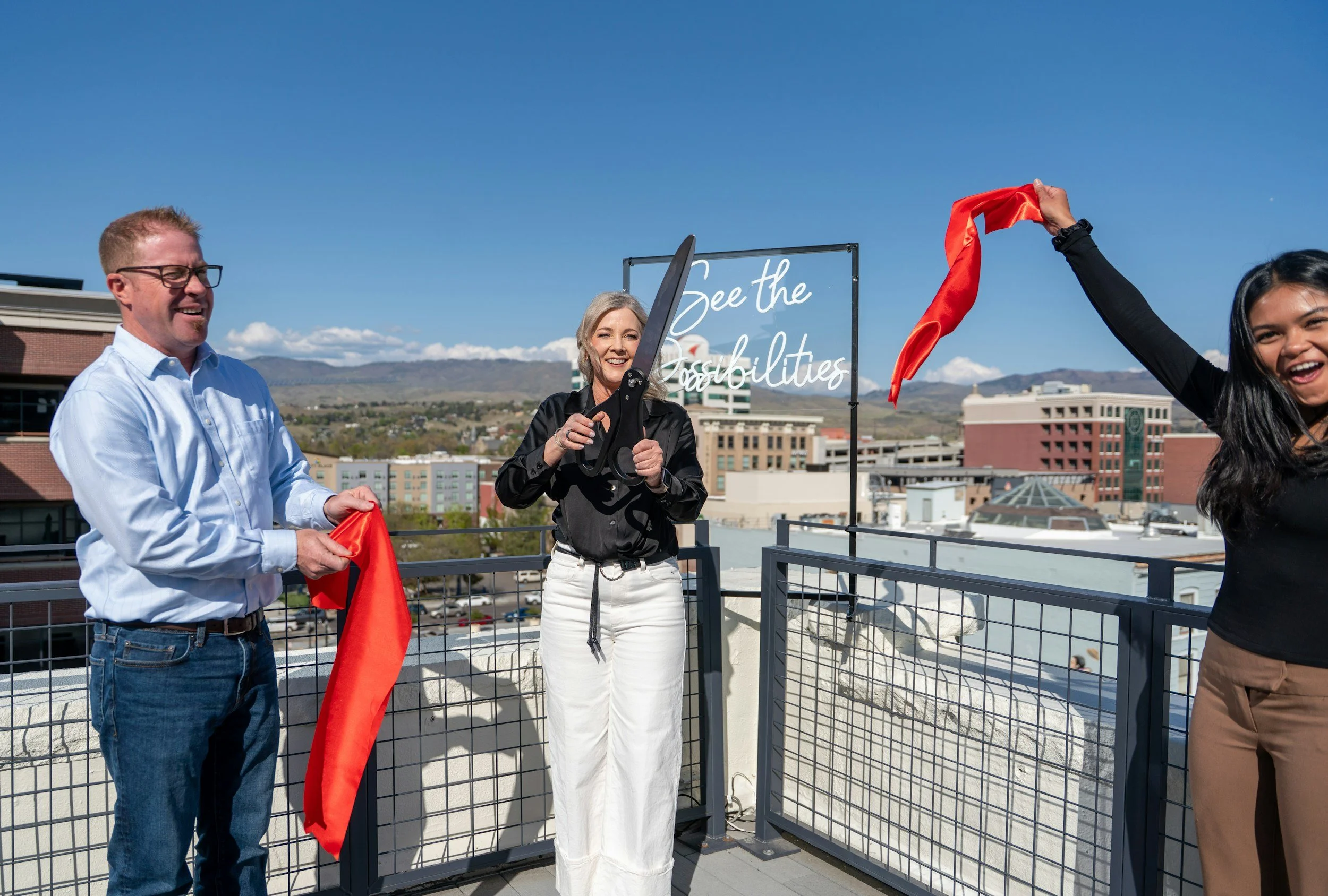 Red Fence Gallery Ribbon Cutting