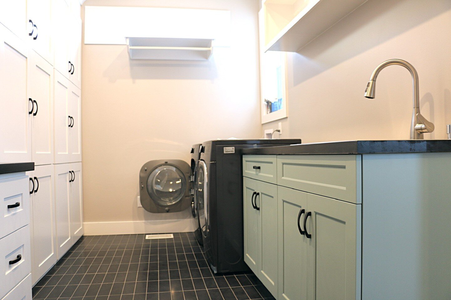 These home owners needed storage in their laundry room. Custom cabinets did the trick!