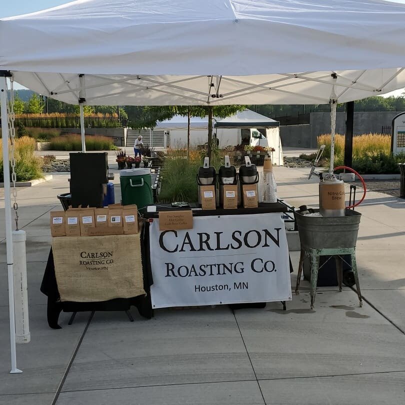 table of coffee at farmers market 