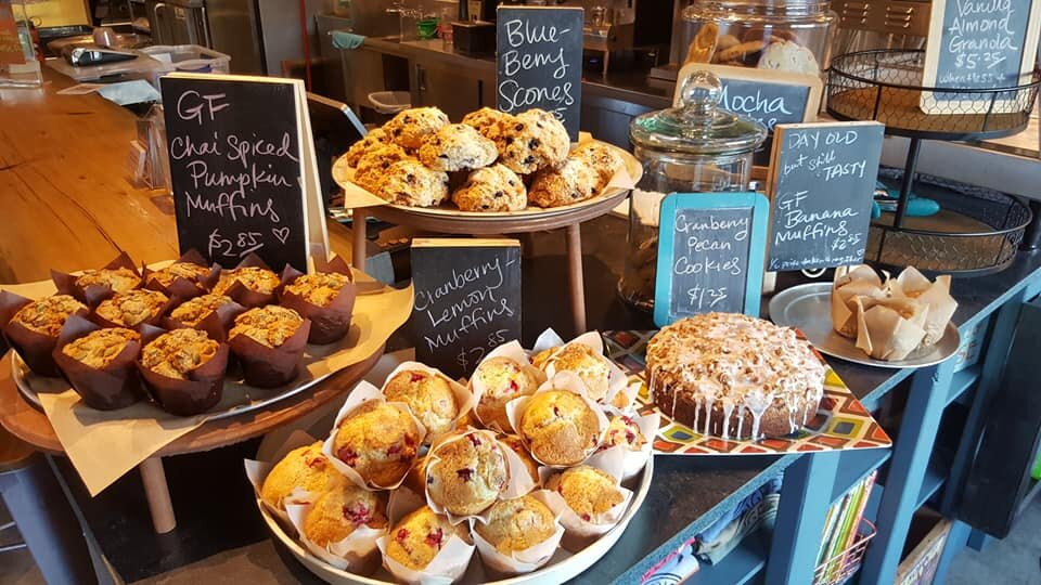 Display of baked goods including muffins and scones