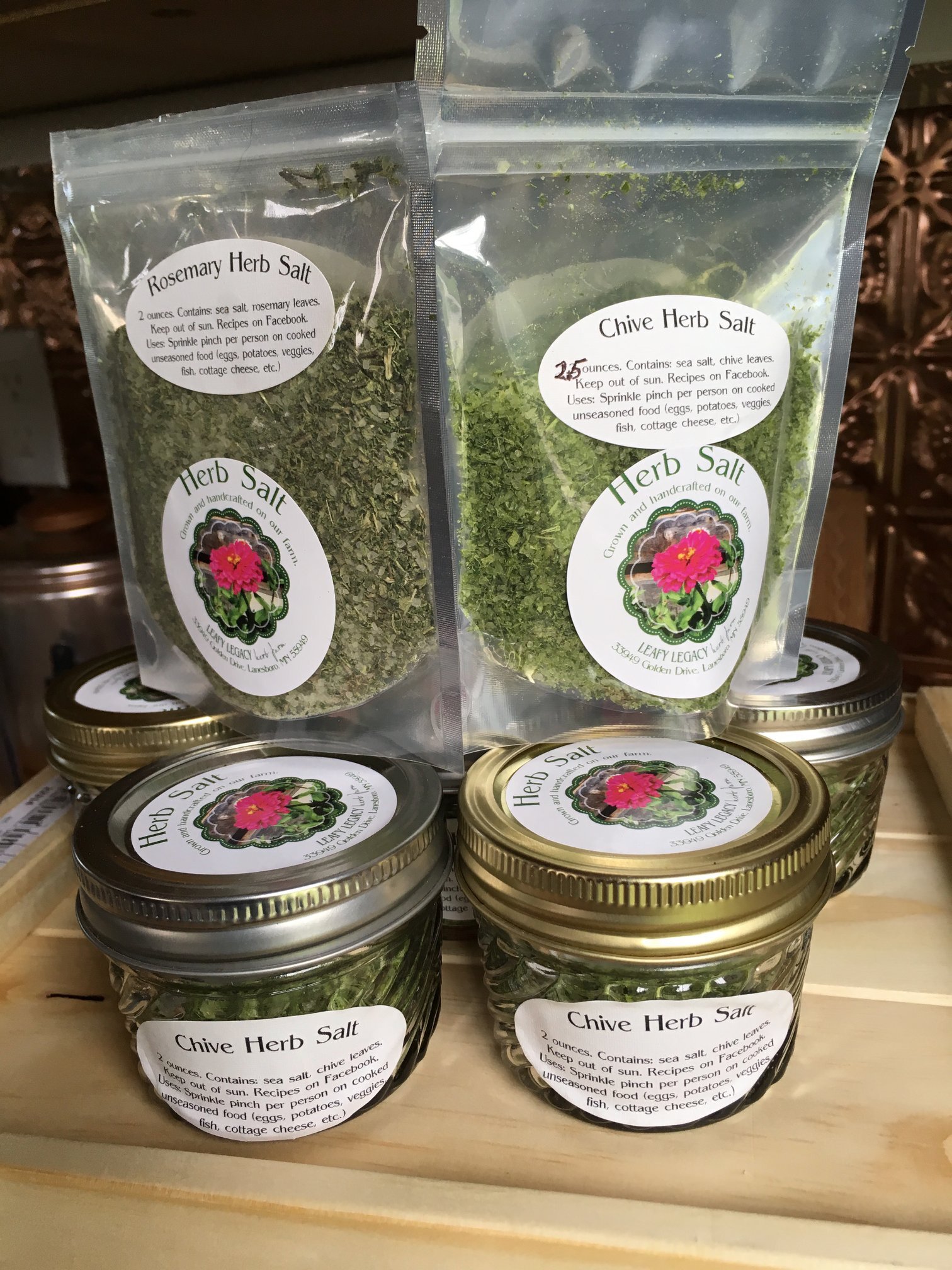 Packaged herb salts on a table