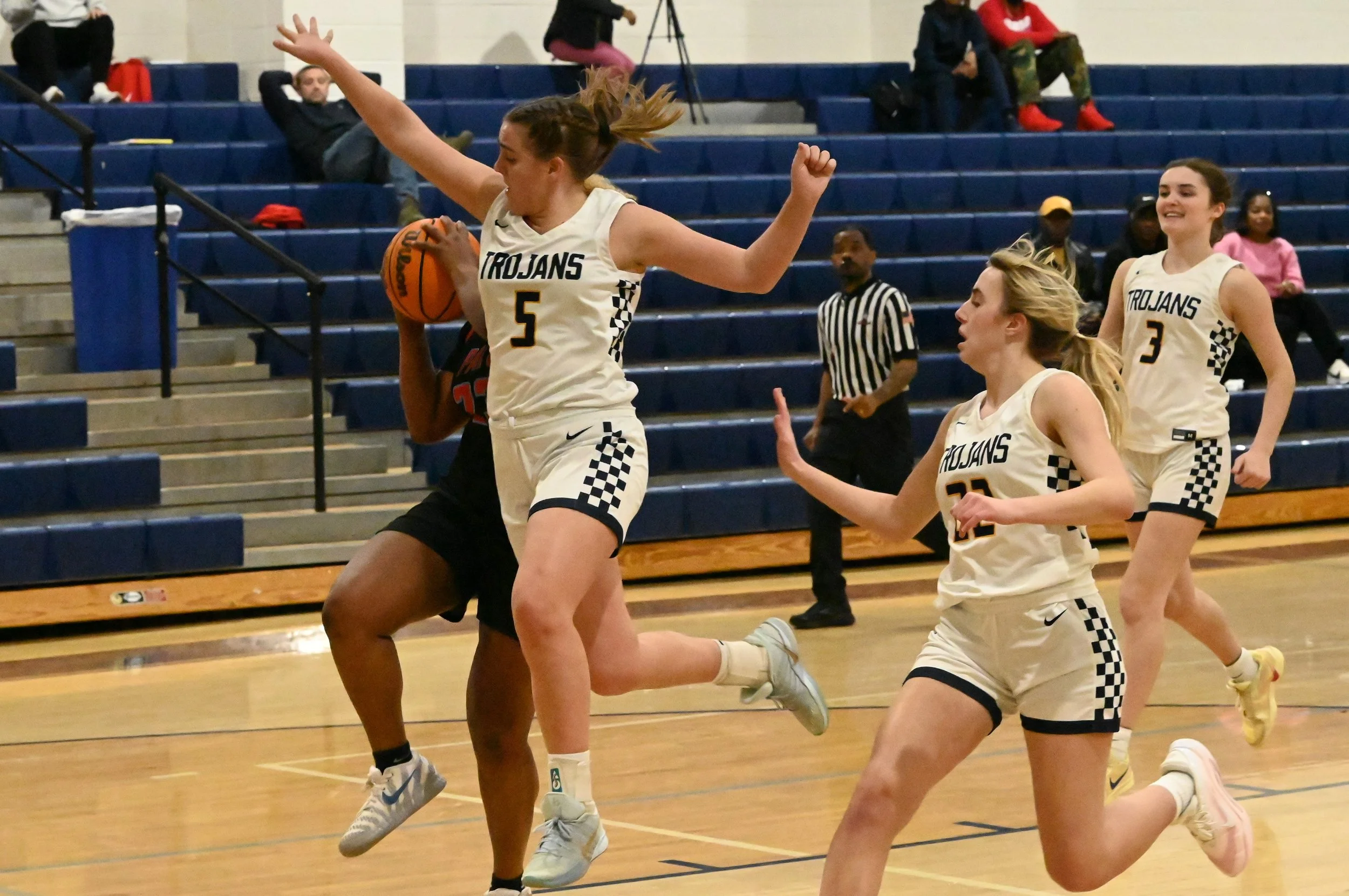 SJ Natalie Barton tries to stop HT Blakeley Nixon.JPG