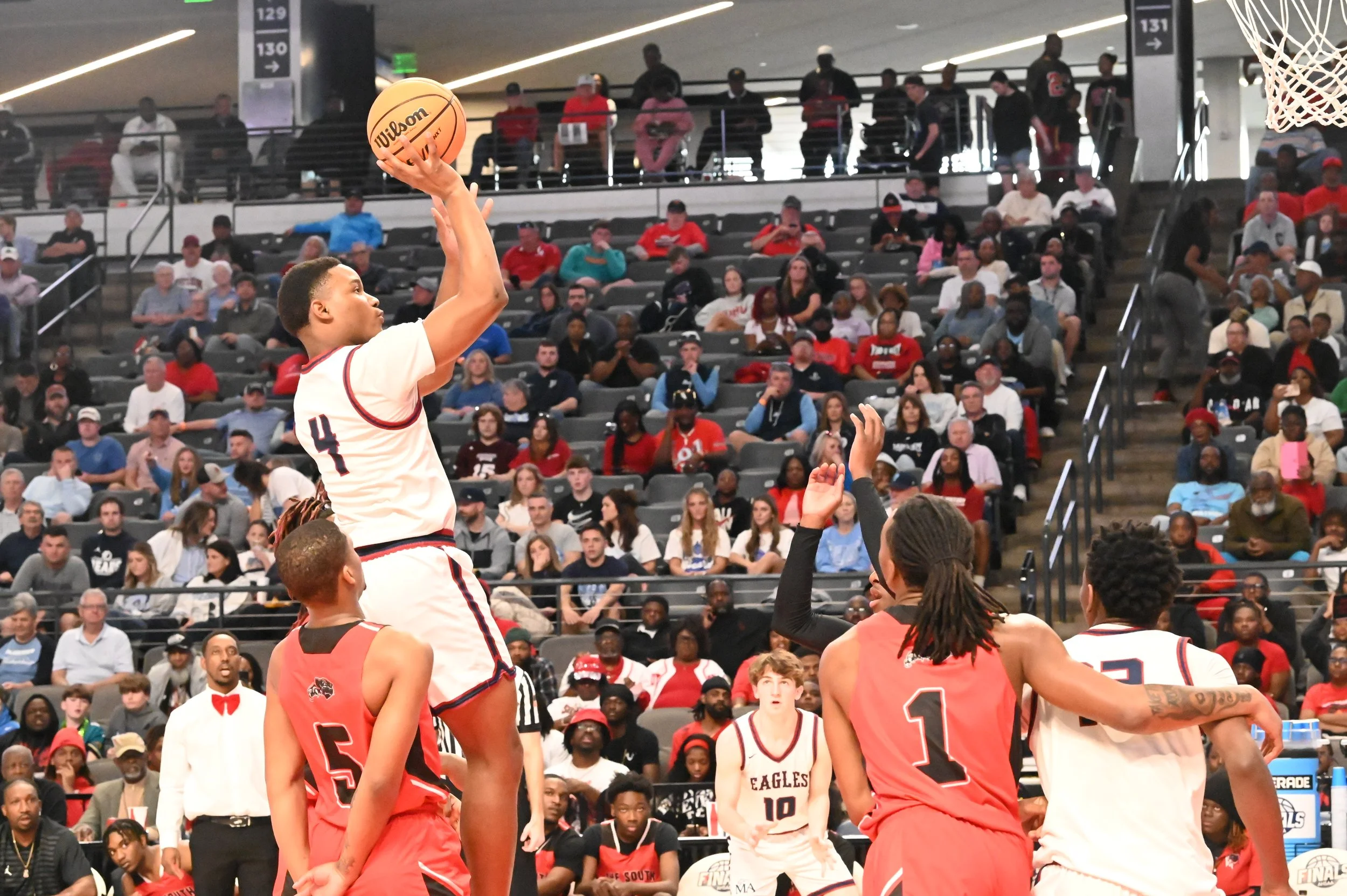 MA Braden Gordon pulls up for a shot in the lane.JPG