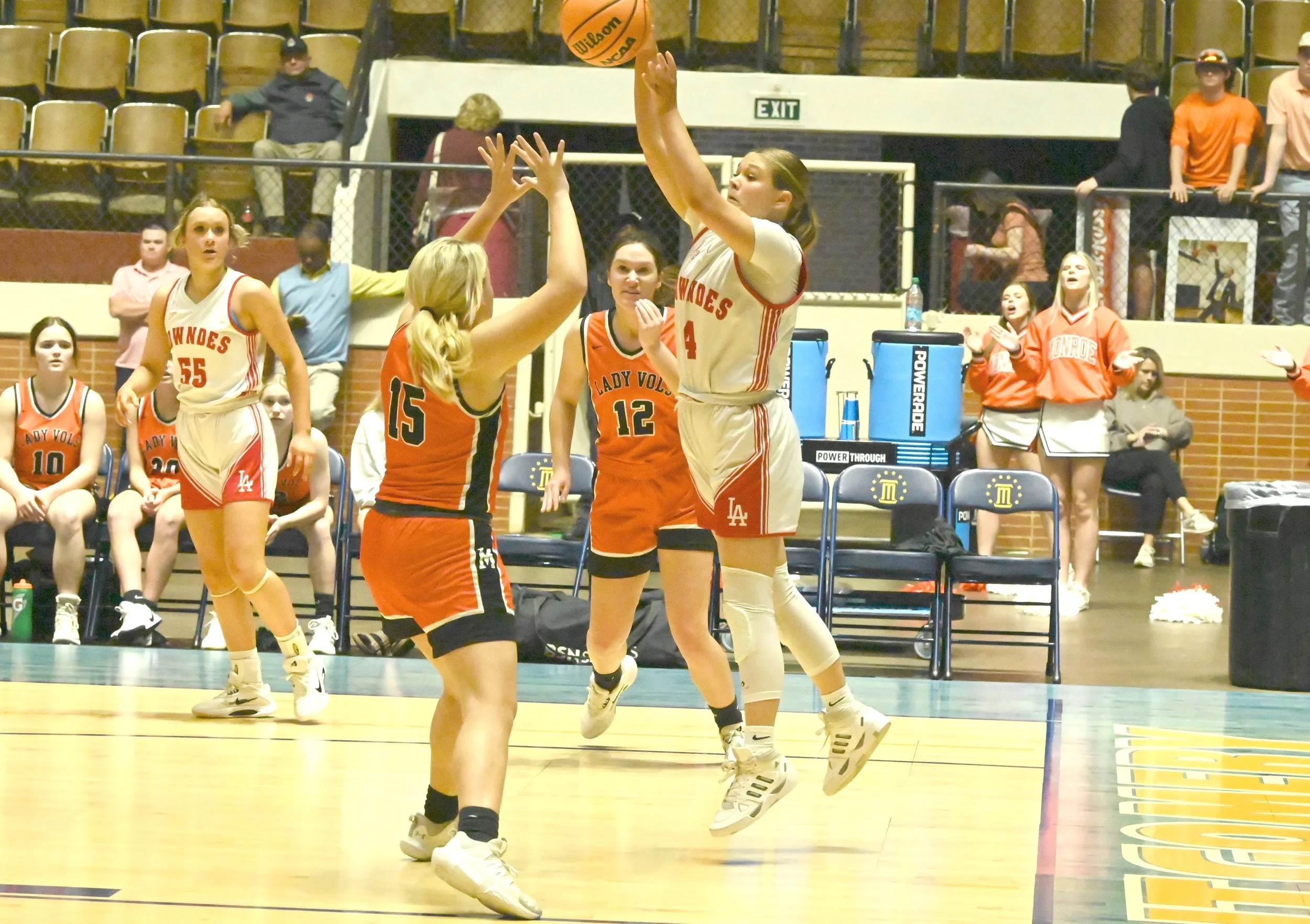 Lowndes Sarah Beth Murchison passes over Monroe defense.JPG