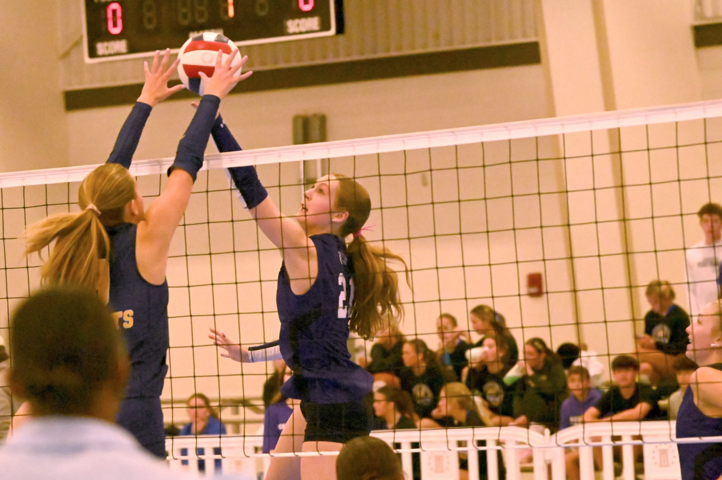 PCAElle Maddox, right, gets the ball past the Knights.JPG