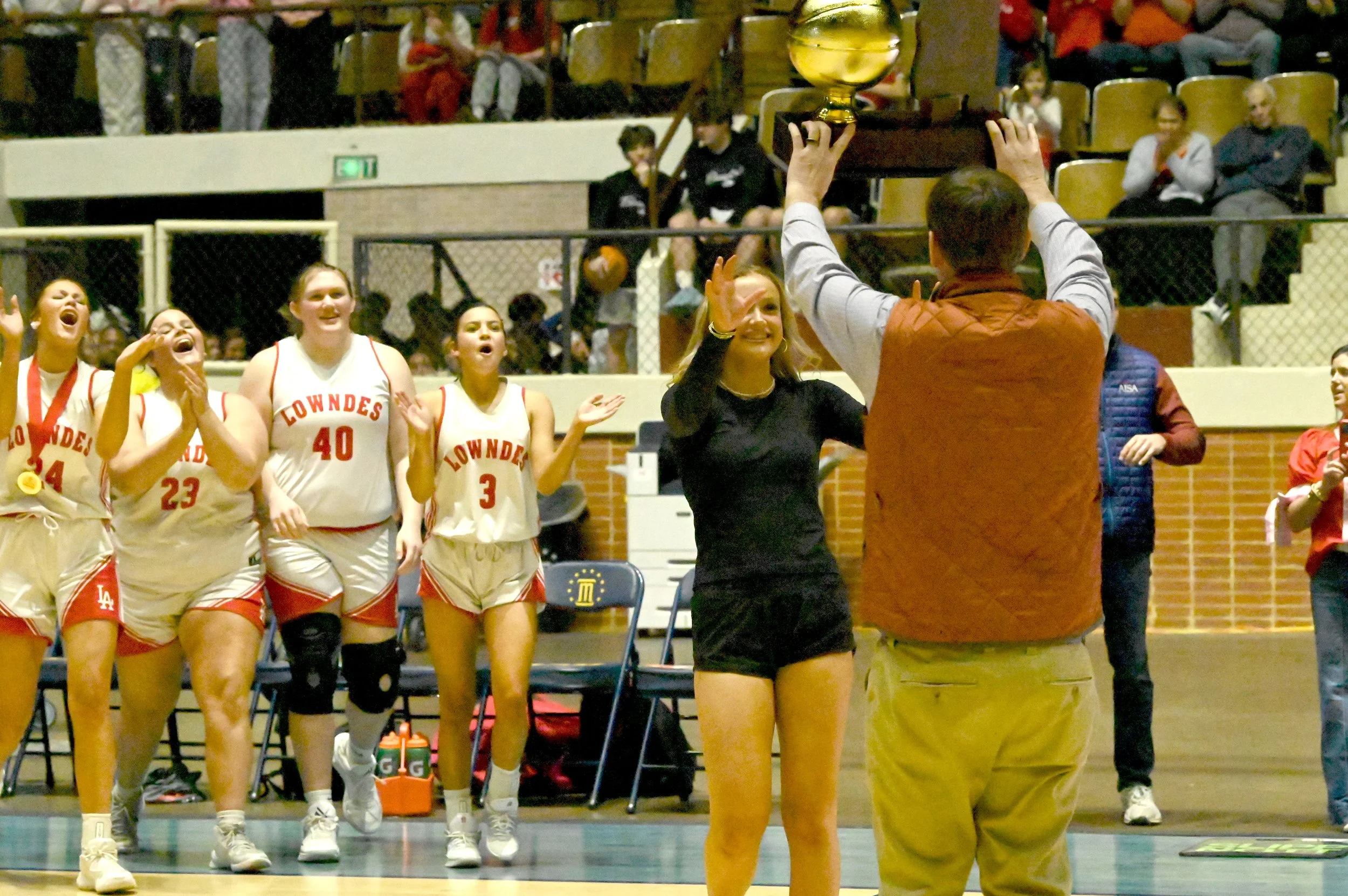 Catie Wallace Self accepts championship trophy.JPG