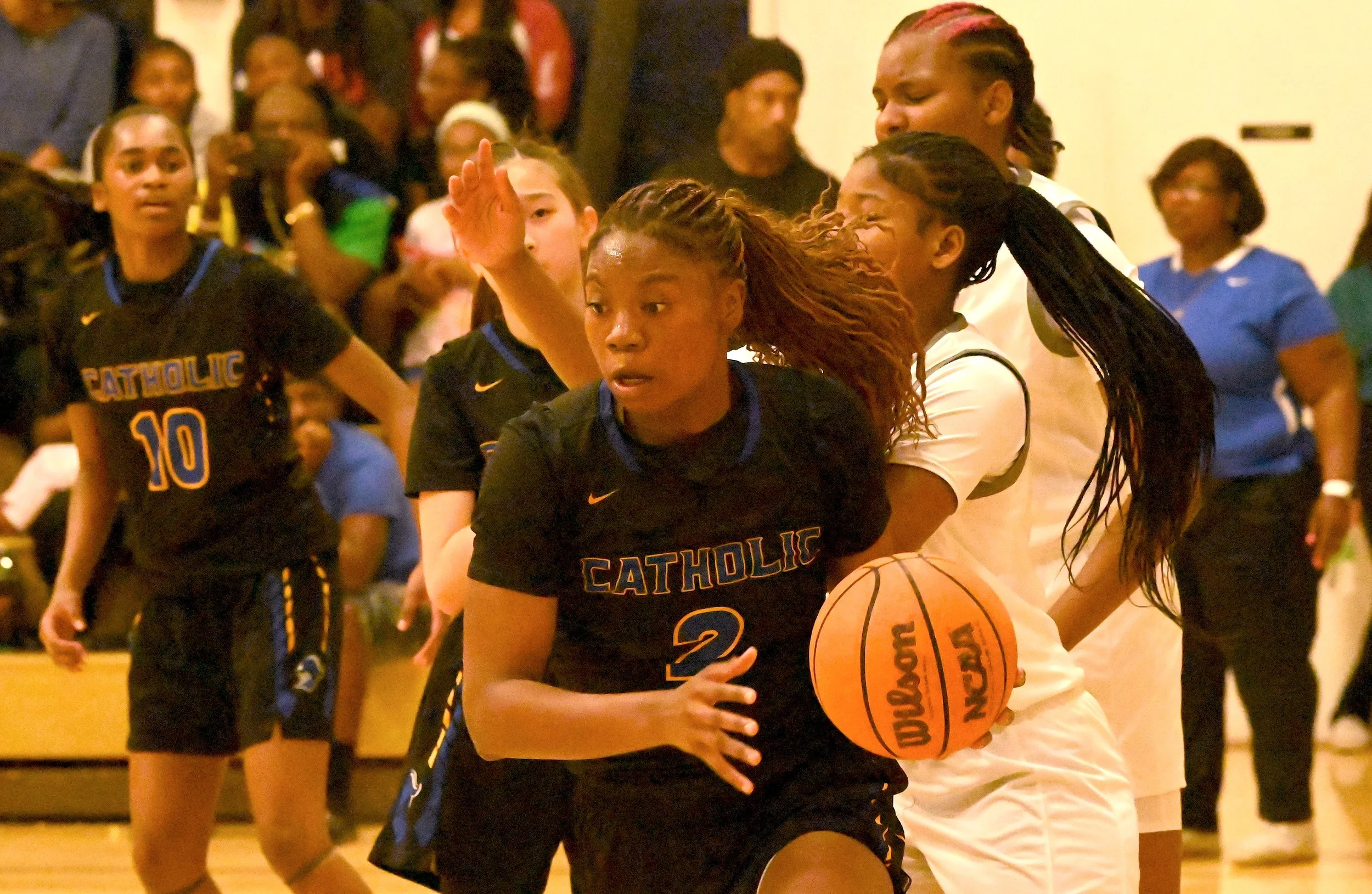 Catholic Hannah Smith on fastbreak.JPG