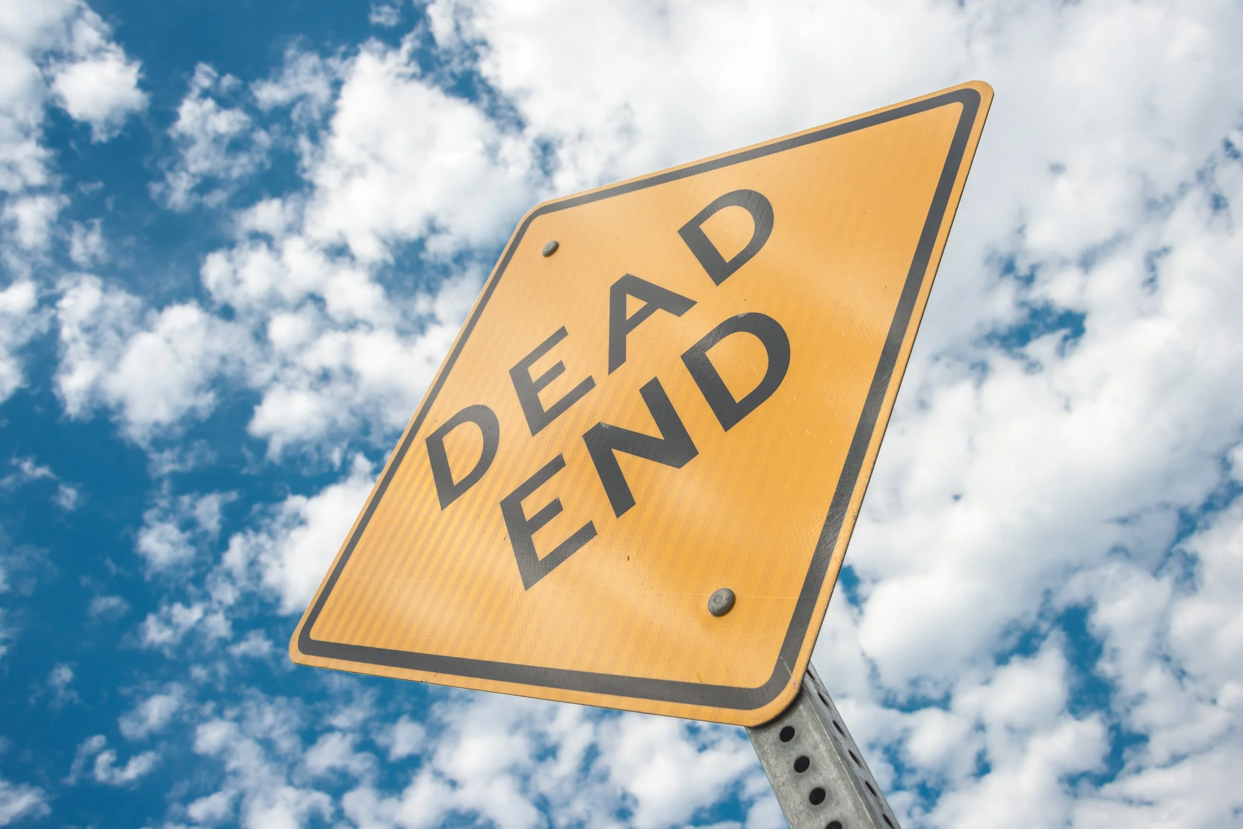 yellow-dead-end-sign-during-day-time-163728.jpg