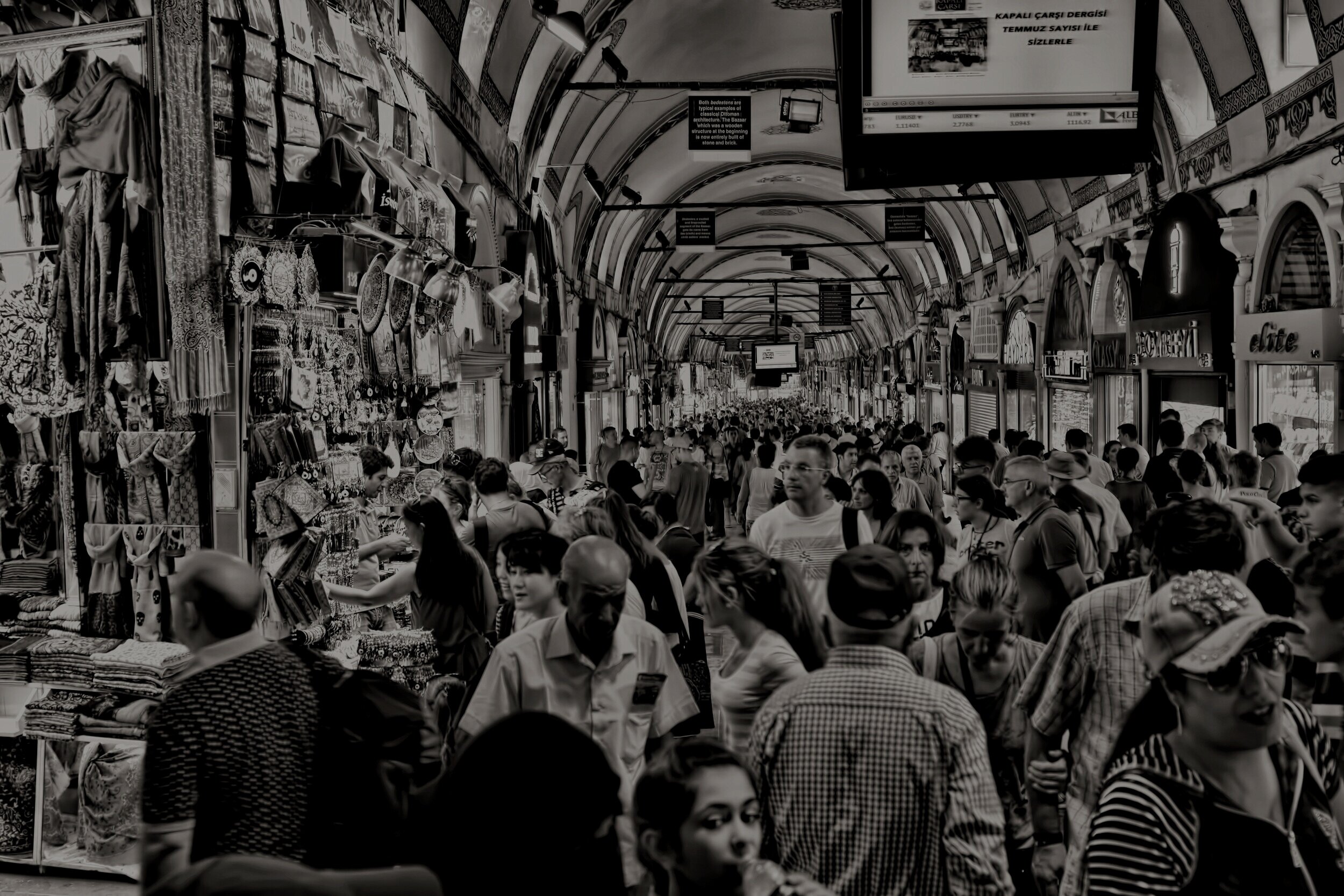 grayscale-photo-of-people-at-market-945982.jpg