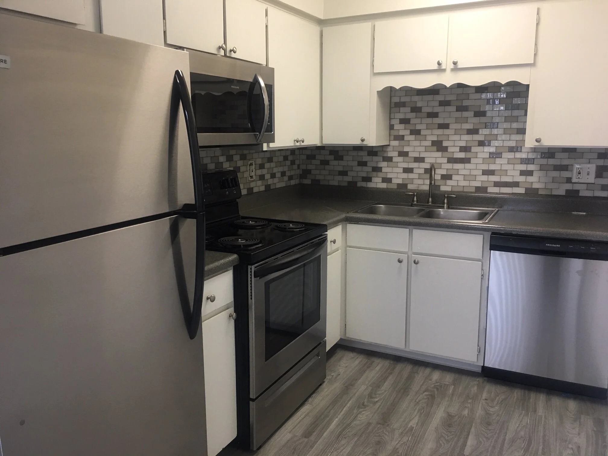  A kitchen of our One Bedroom Apartment at University Square 