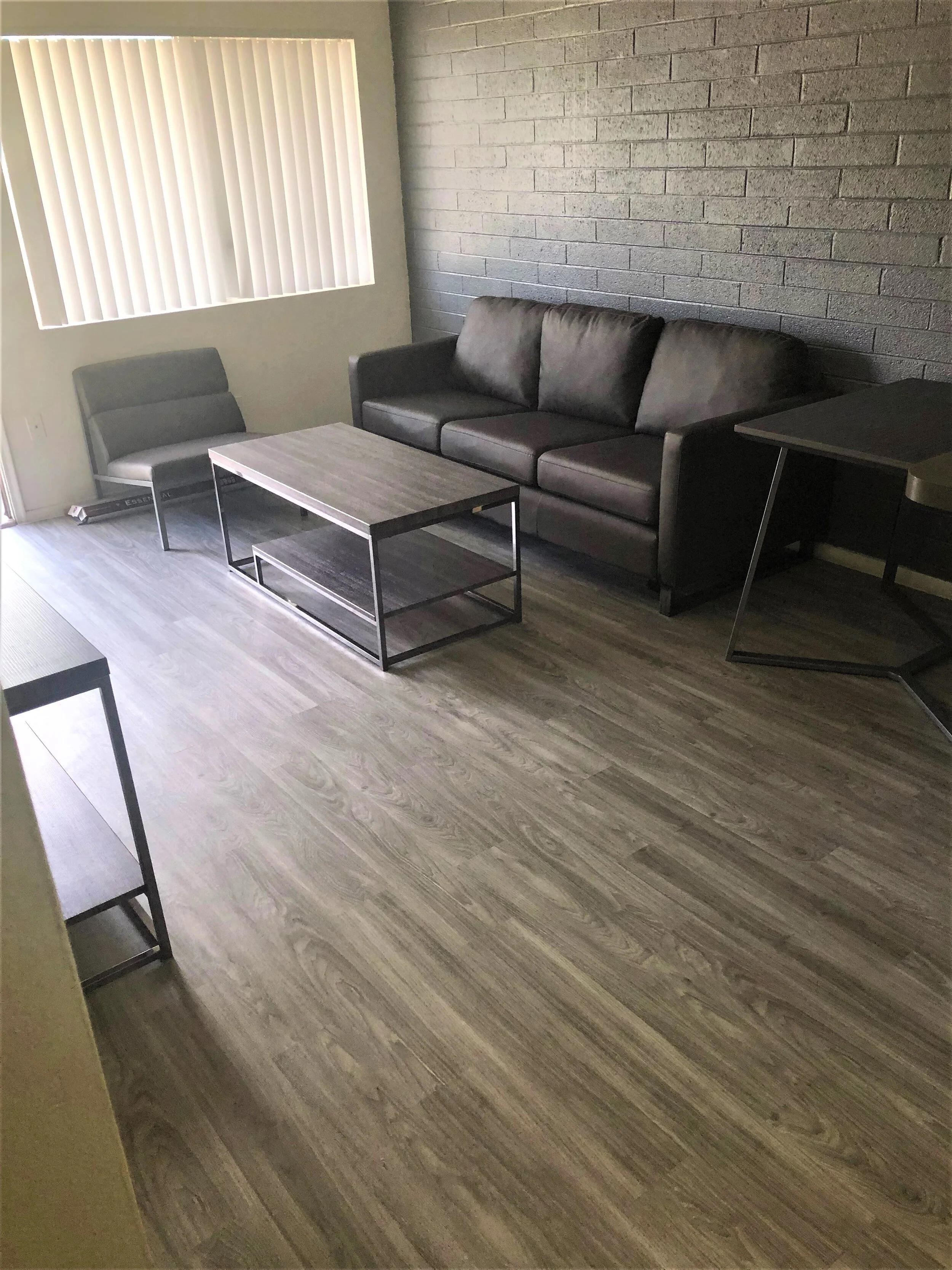  The spacious living room of our two bedroom two bathroom apartment at University Pointe. 