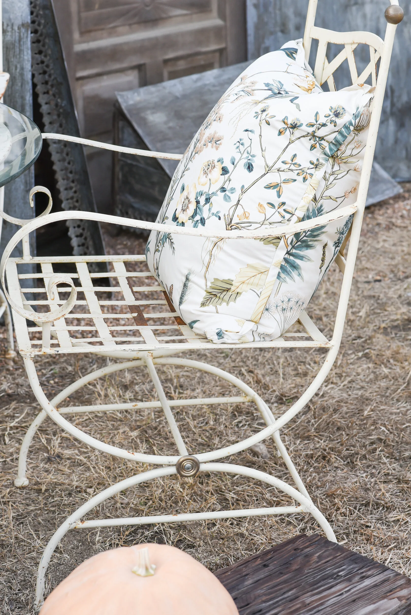 kim-hoegger-home-round-top-outdoor-metal-chair-and-pillow-3.jpg