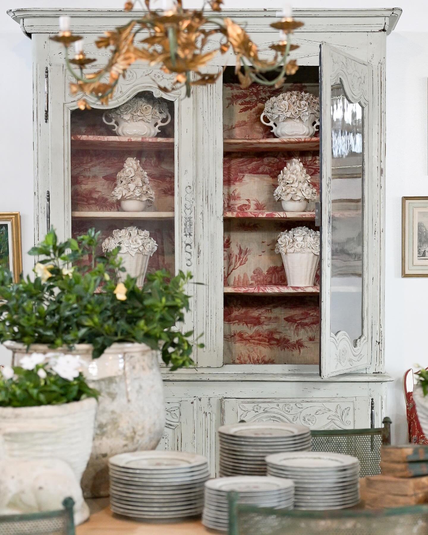 Look at this timeless French pine hutch with the original toile fabric (Circa 19c). The French red is gorgeous &amp; is one of my personal favorites! I honestly don&rsquo;t know how this one of a kind piece is still available. Please DM us for questi