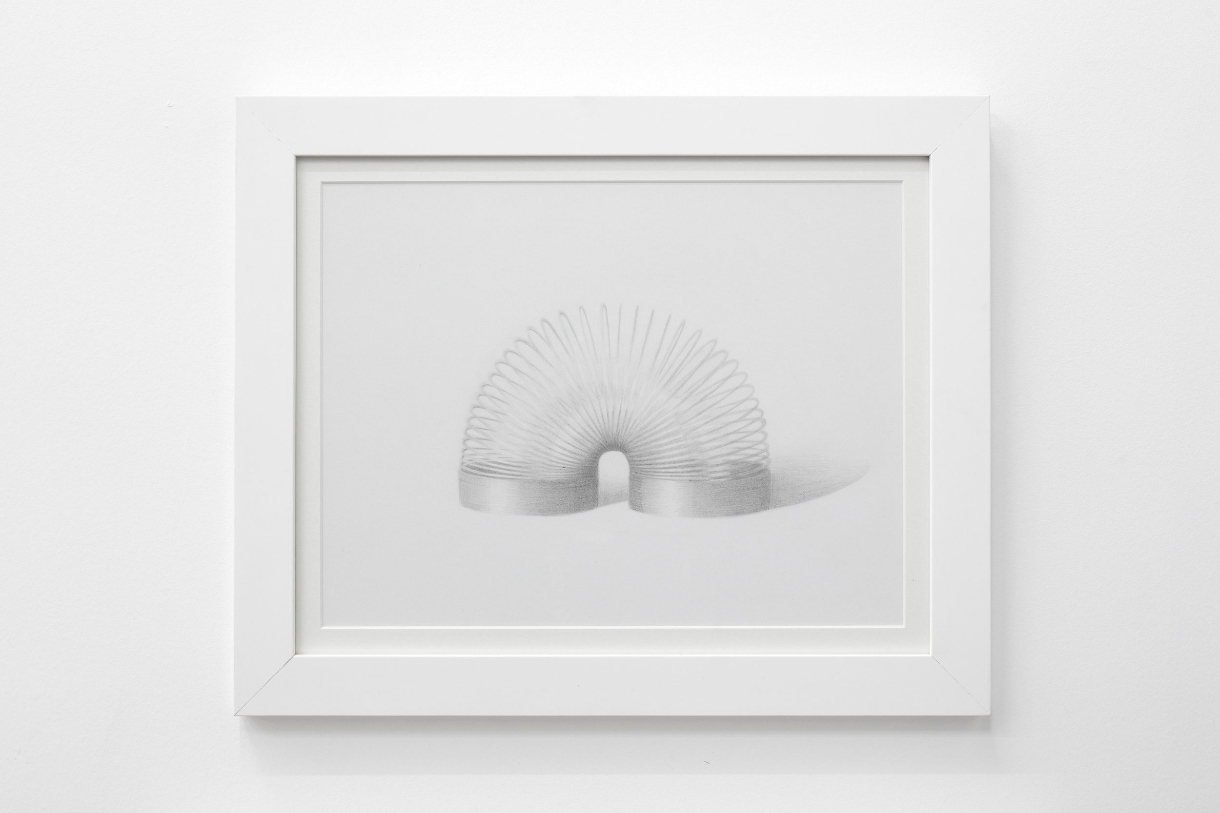  Anastasia Denos,  Slinky  2, 2022. Graphite on paper, 13.75 x 16.5 inches (35 x 42 cm) (framed dimensions). 