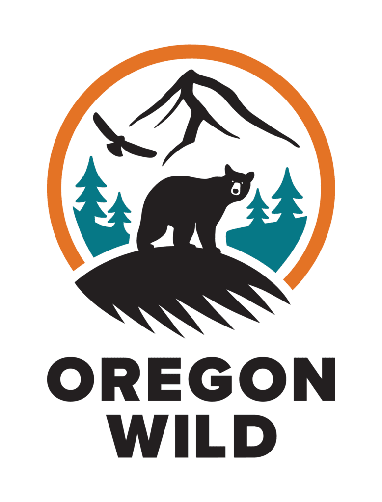 Stylized logo of Oregon Wild featuring a mountain, trees, a bear, and a bird, with the text 'Oregon Wild' below.