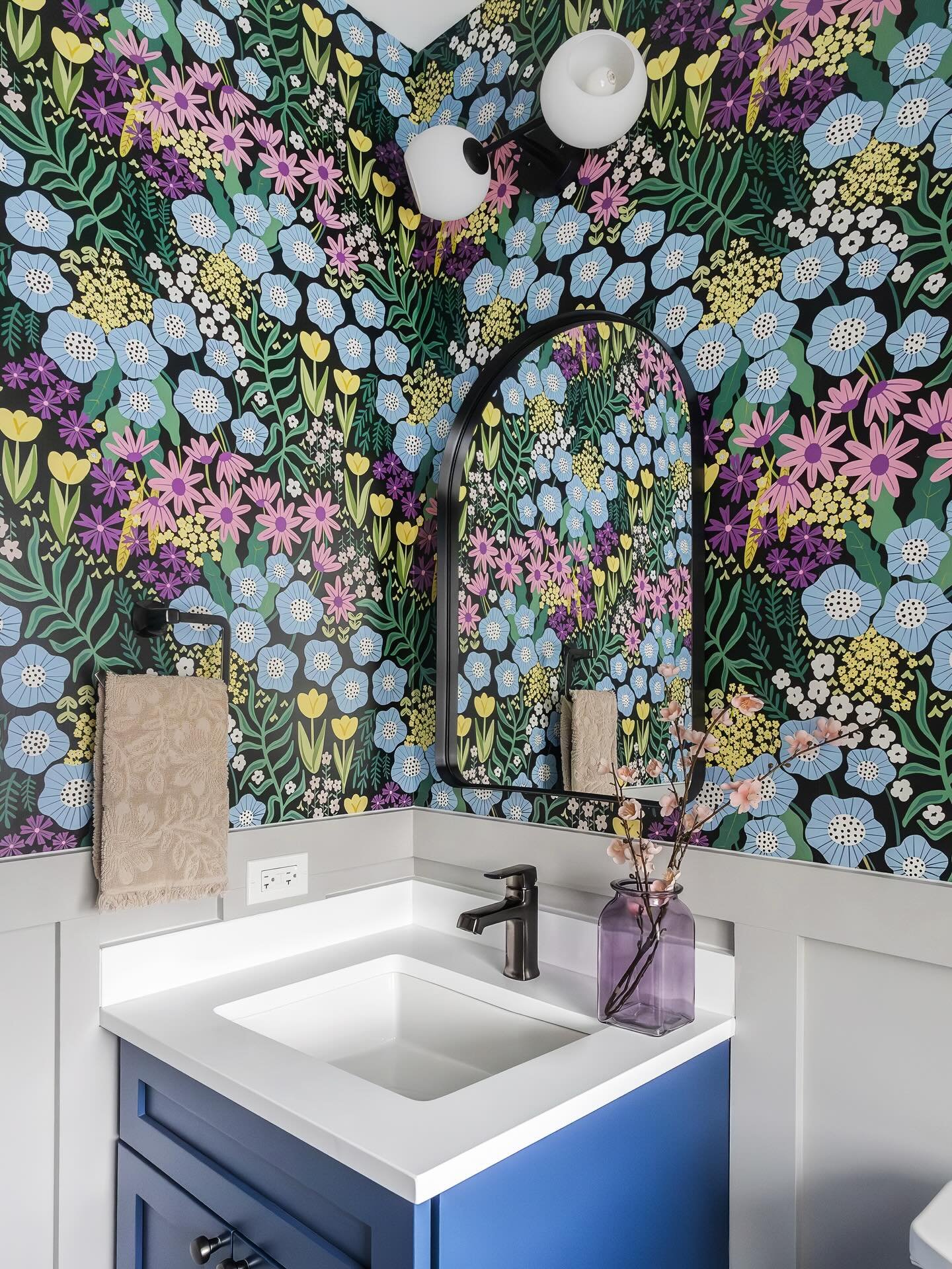 This powder room remodel proves that bold design belongs everywhere. A playful colorful wallpaper paired with mosaic floor tiles creates the perfect mix of charm. Sometimes the smallest rooms are the most fun to design!

Design by @magdainteriors_ 
R