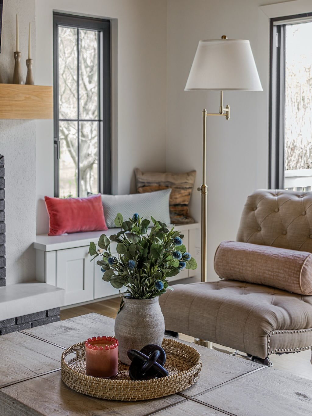 The fireplace was always the focal point&mdash;but it wasn&rsquo;t working as hard as it could.

By adding custom bench seating and hidden storage on both sides, we turned this wall into a moment that&rsquo;s not only beautiful, but deeply functional