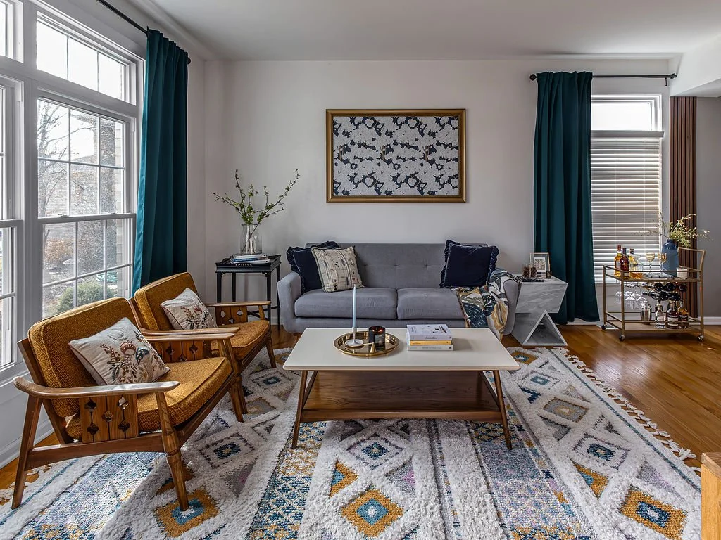 A Warm and Inviting Living Room Transformation with Layered Design