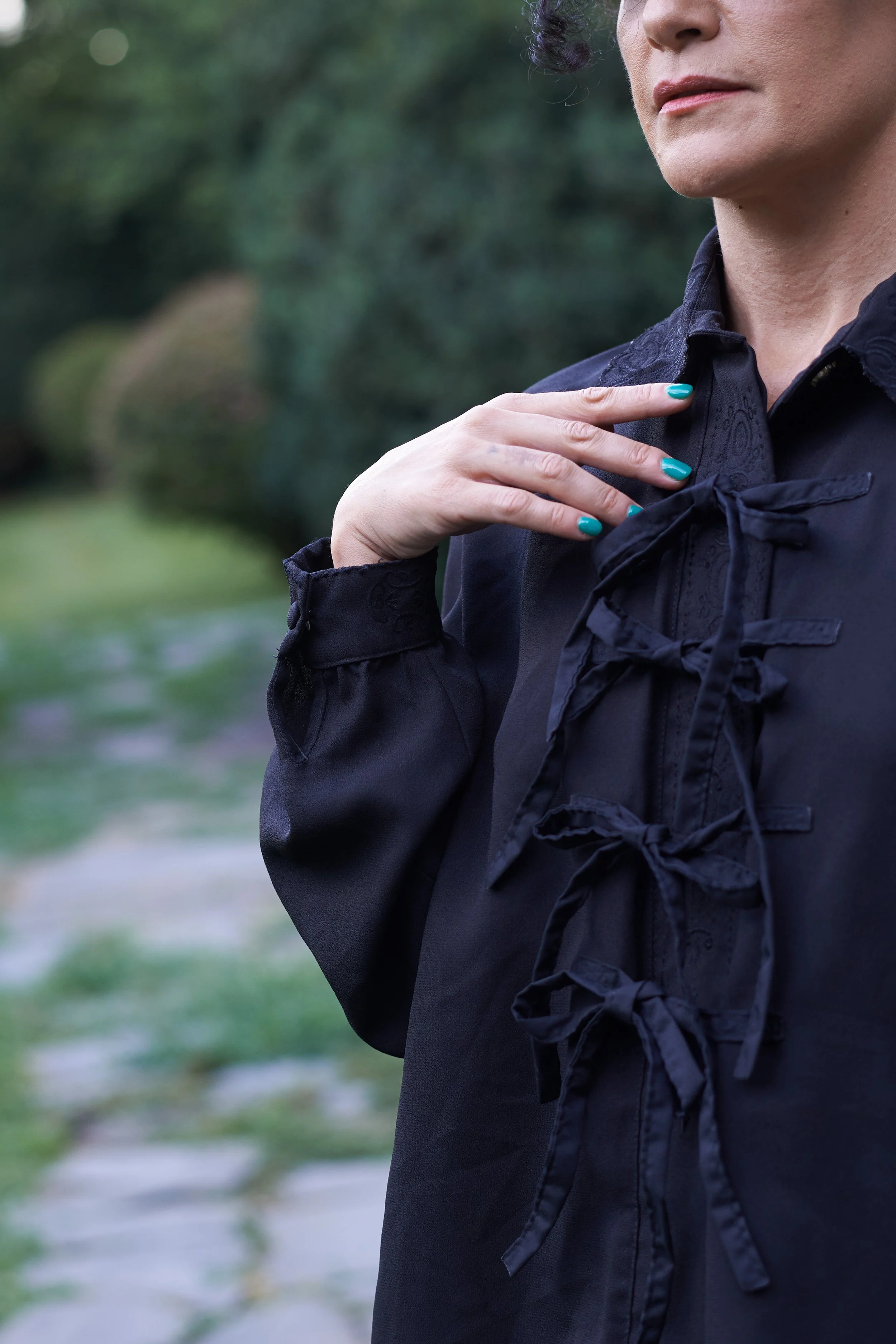 Black long sleeve button up shirt with ties