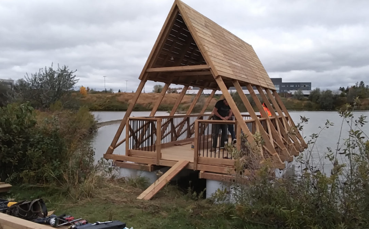  October 11, 2018 - After three days of on-site construction, we are pleased to say that the NRC buoyant pavilion is ready to take on the winter and the coming freeze! The railings and the cross-bracing, shown below, were the final components to atta