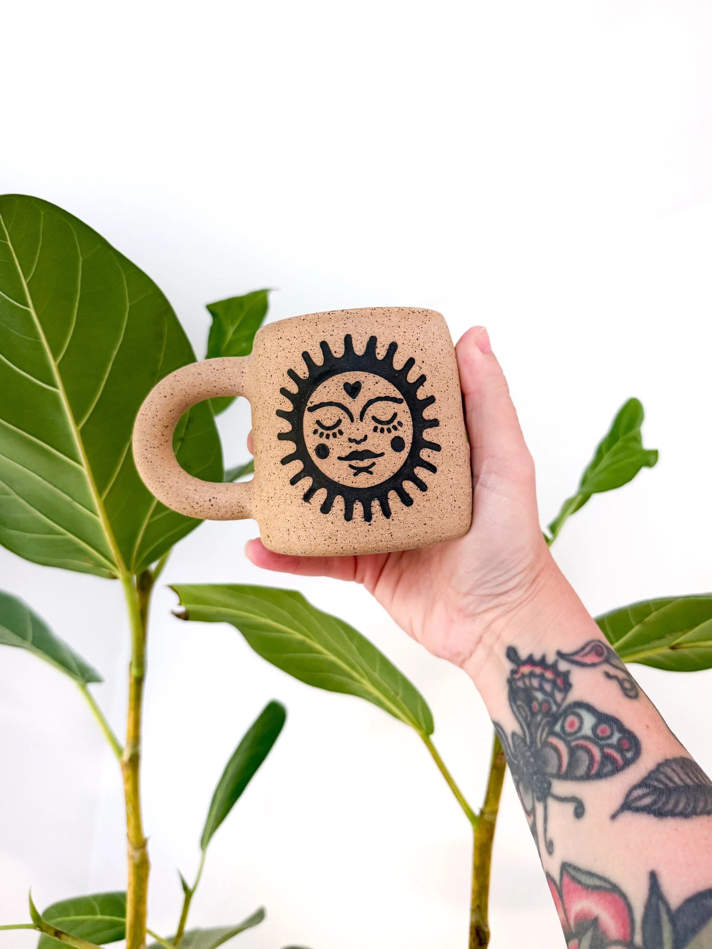 the shop update we&rsquo;ve all been waiting for is finally coming. i&rsquo;ll be restocking my site on WEDNESDAY JULY 22nd at 12pm central. 

this sunny new cup is coming in the restock with my other new design i made in my previous post &amp; im so