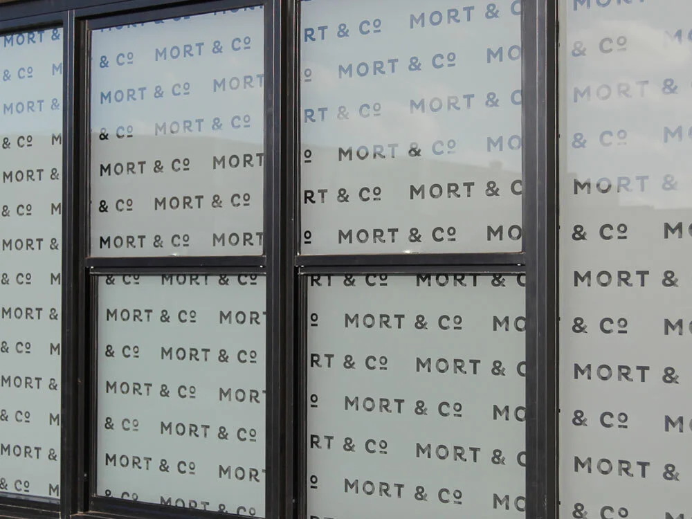 Frosting-and-Privacy-Film-Signs-On-Time-Mort-&-Co-Window.jpg