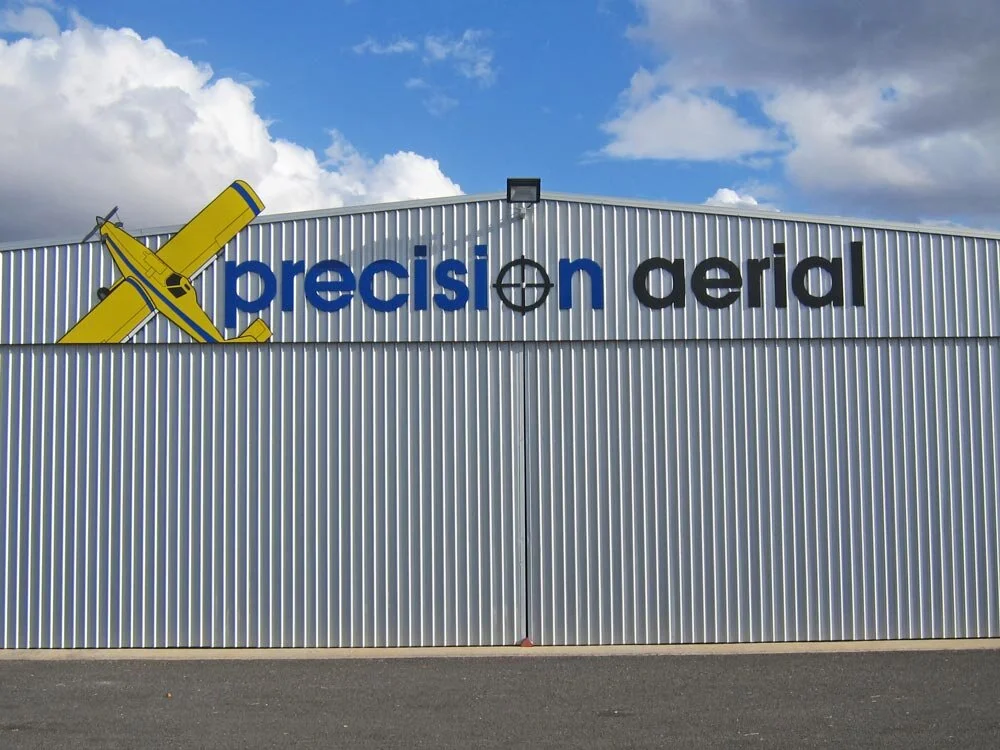Non-Illuminated-3D-Signs-On-Time-Precision-Aerial.jpg