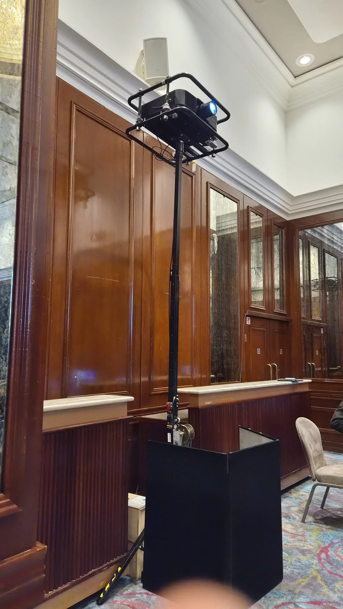 Laser projector on winch stand