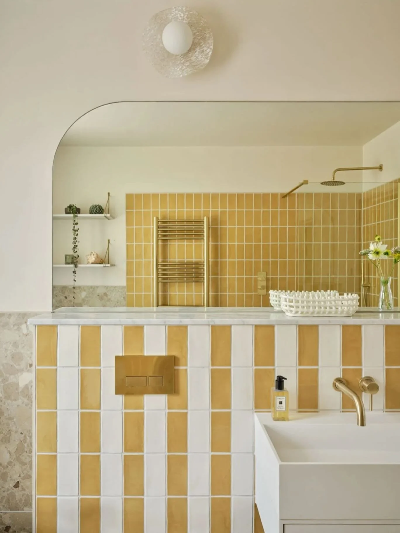 A snapshot of this sunshine yellow bathroom for this freezing cold day ☀️
&bull;
This bathroom was a joy to design for our full house design project in Wellow. We specified off white and mustard yellow @bertandmaybristol metro tiles which have a real