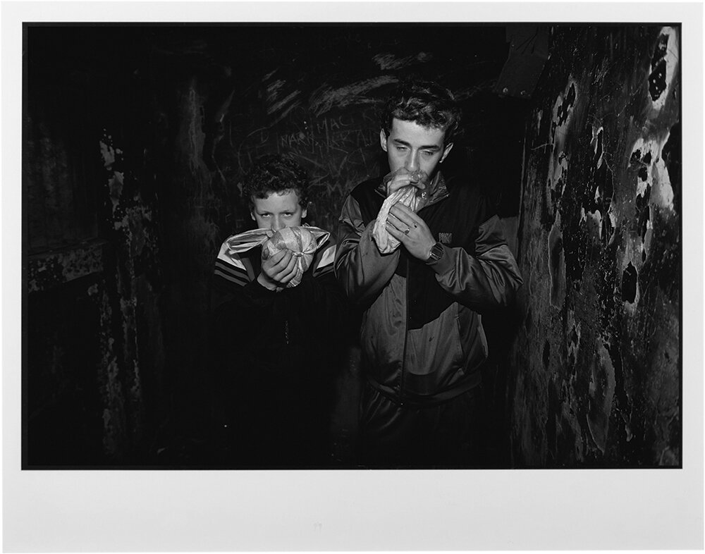  Two Catholic boys in Unity Flats sniff glue in Belfast, Northern Ireland. 1988 