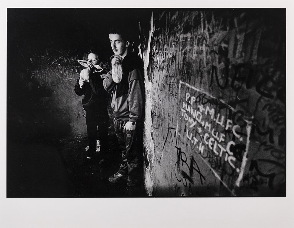  Two Catholic boys in Unity Flats sniff glue in Belfast, Northern Ireland. 1988 