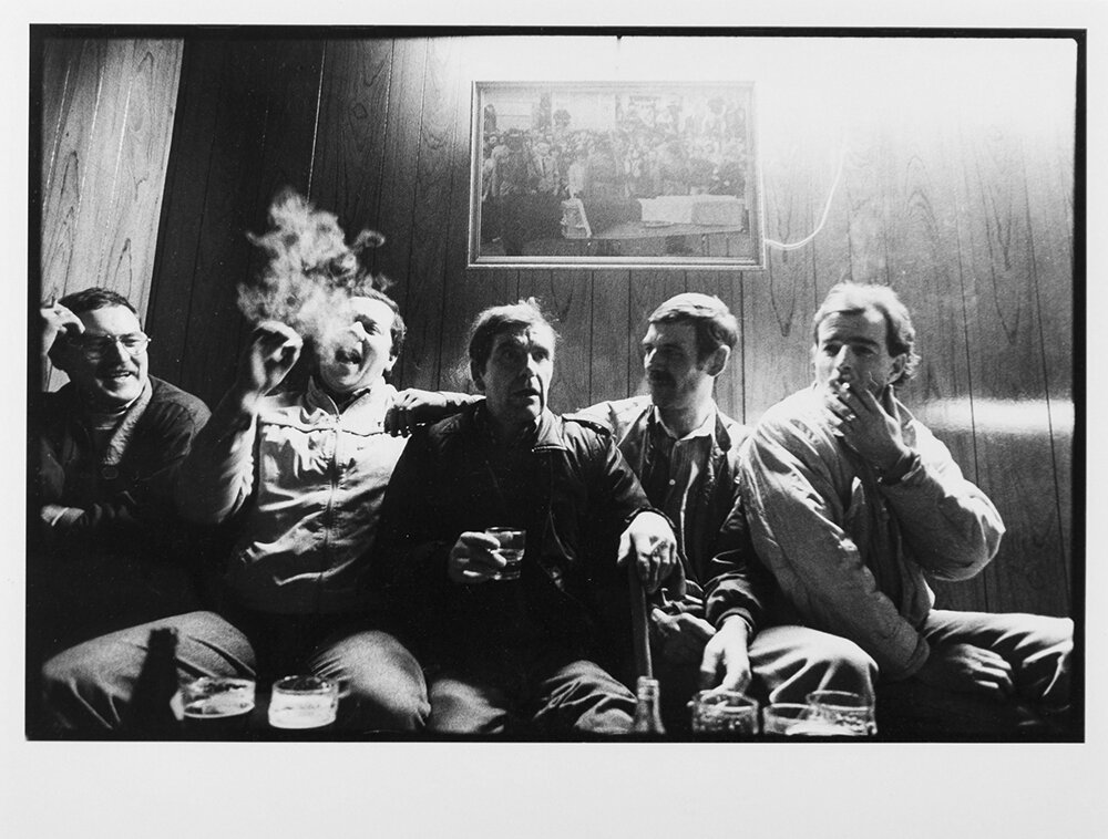  Bar patrons enjoy a drink and a smoke at the Felon's Club, an IRA owned bar for members and ex-prisoners in North Belfast, Northern Ireland. 1988 