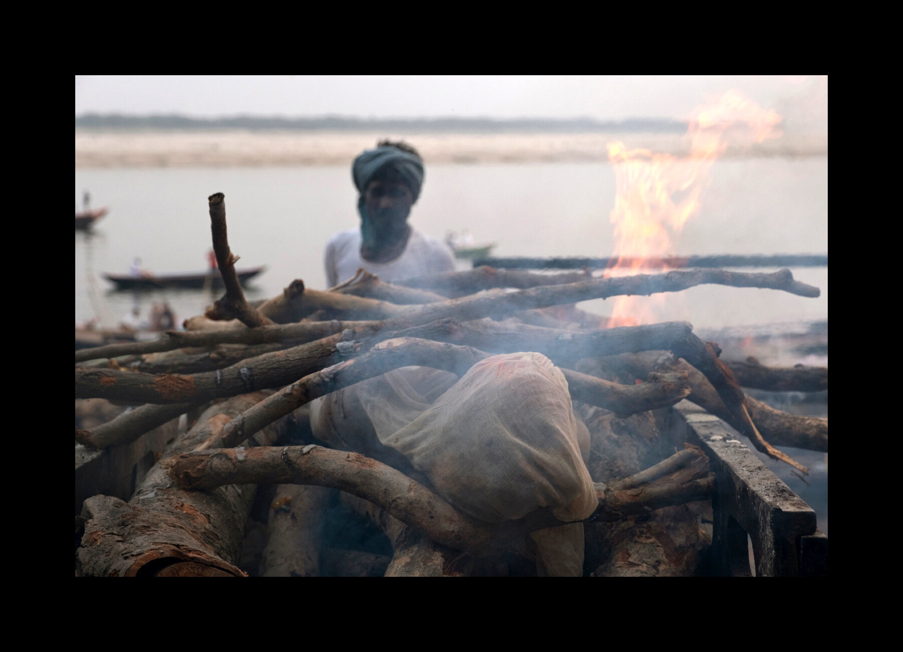  Dead bodies burn at the Manikarnika Ghat, the main cremation ghat in Varanasi, India. 2019 