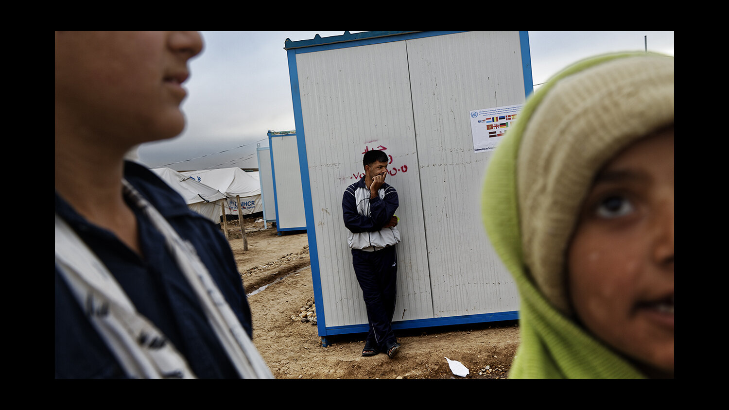  Refugees gather at the Domiz Refugee camp for Syrians, in Dohuk, Iraq. 2013 