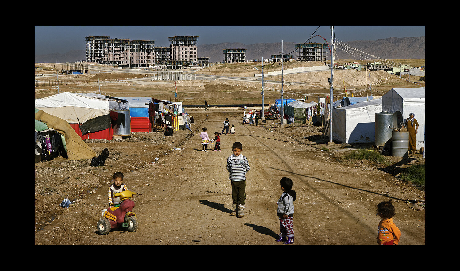  Children play in the Domiz camp for Syrian refugees just outside of Dohik, Iraq. 2013 