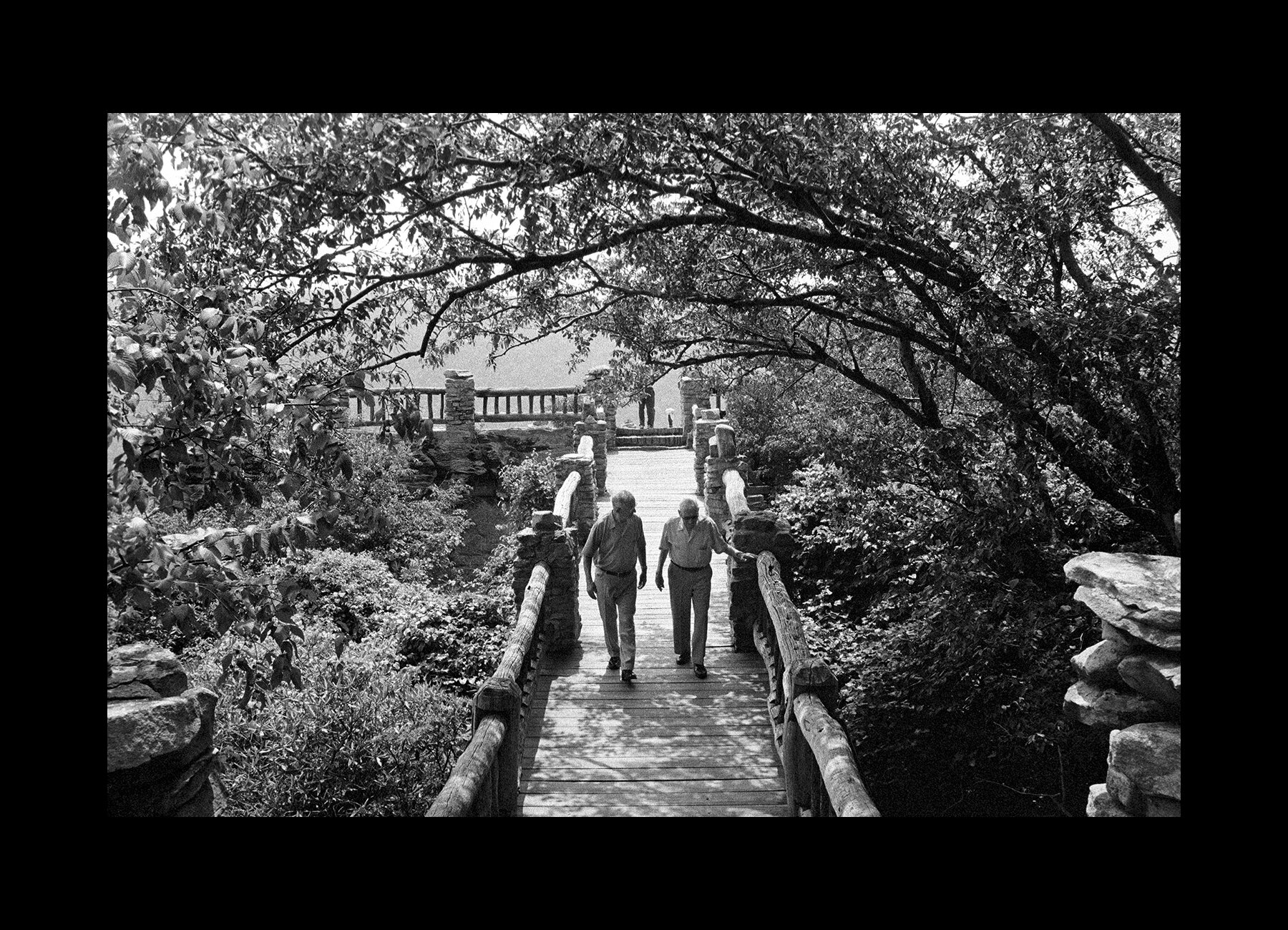  Warren Dewitt and Arden Peters walk together in Gladesville, West Virginia. 2000 