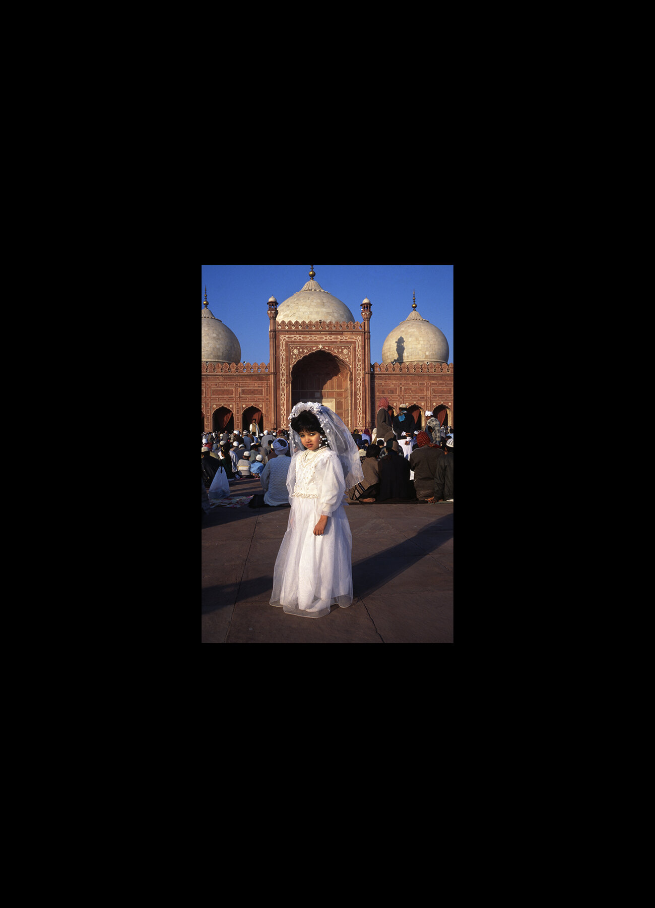  Young girl at Badshahi Mosque March in Lahore, Pakistan. 1997 