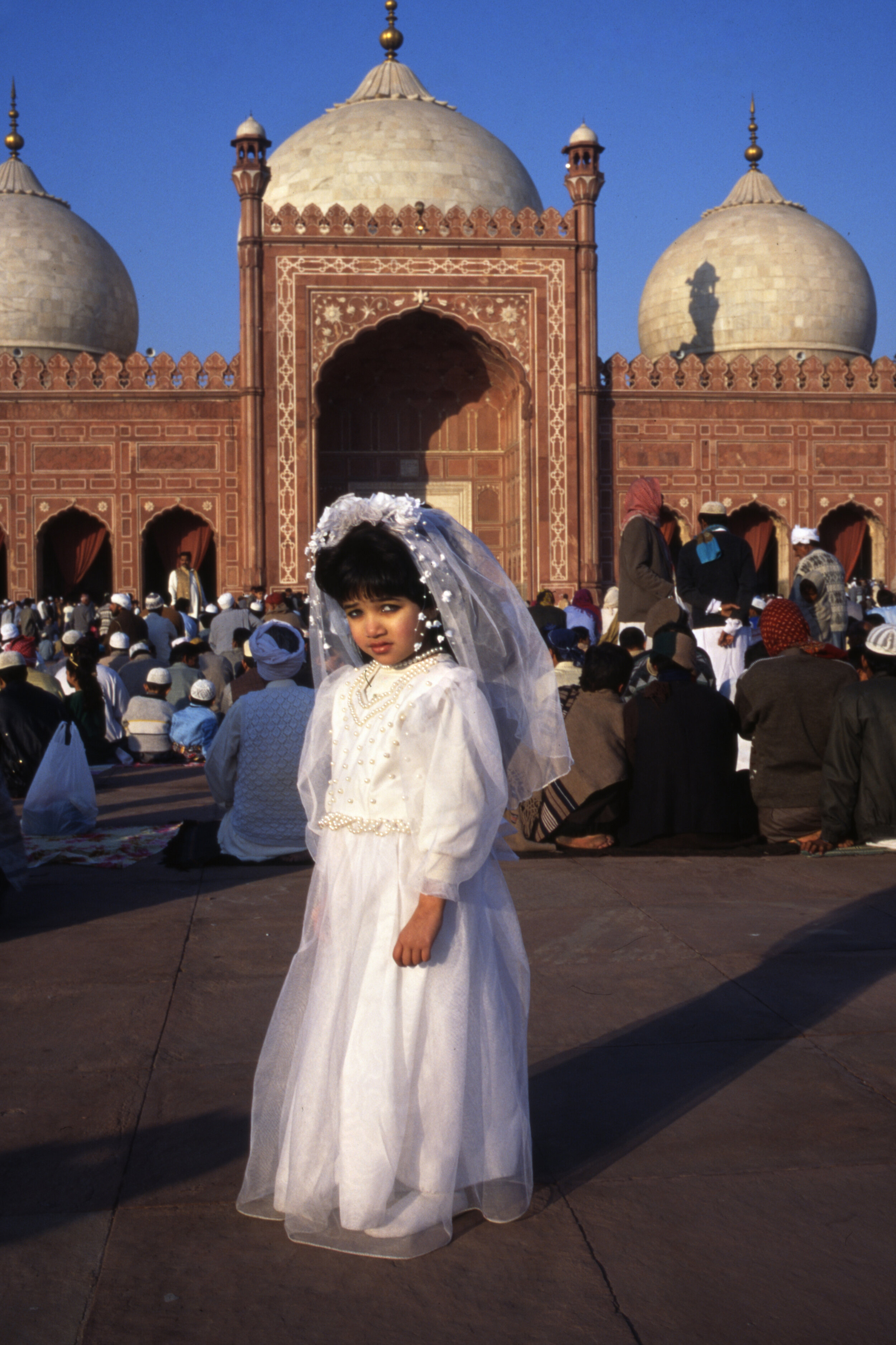  Young girl at Badshahi Mosque March in Lahore, Pakistan. 1997 