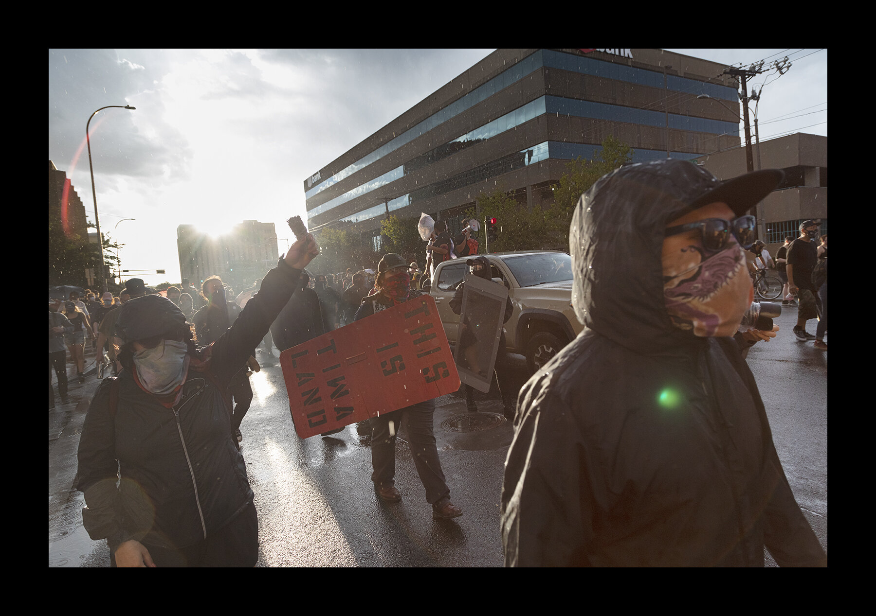  Hundreds peacefully demonstrated through a rainstorm in Albuquerque against President Trump’s plan to send federal officers to New Mexico’s largest city.  