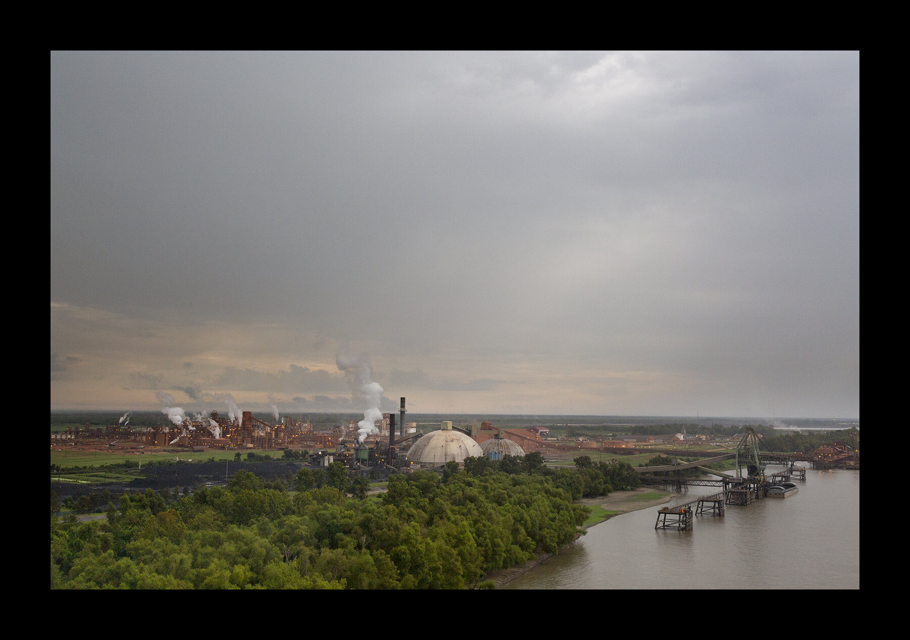  Petrochemical facilities along the Mississippi River in Louisiana, known as "cancer alley" or "death alley." Over 200 of these industrial facilities have polluted the local environment for decades. Cancer, asthma and other ailments are some of the h